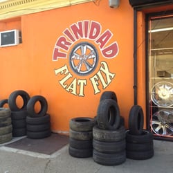 flat fix near me 11590