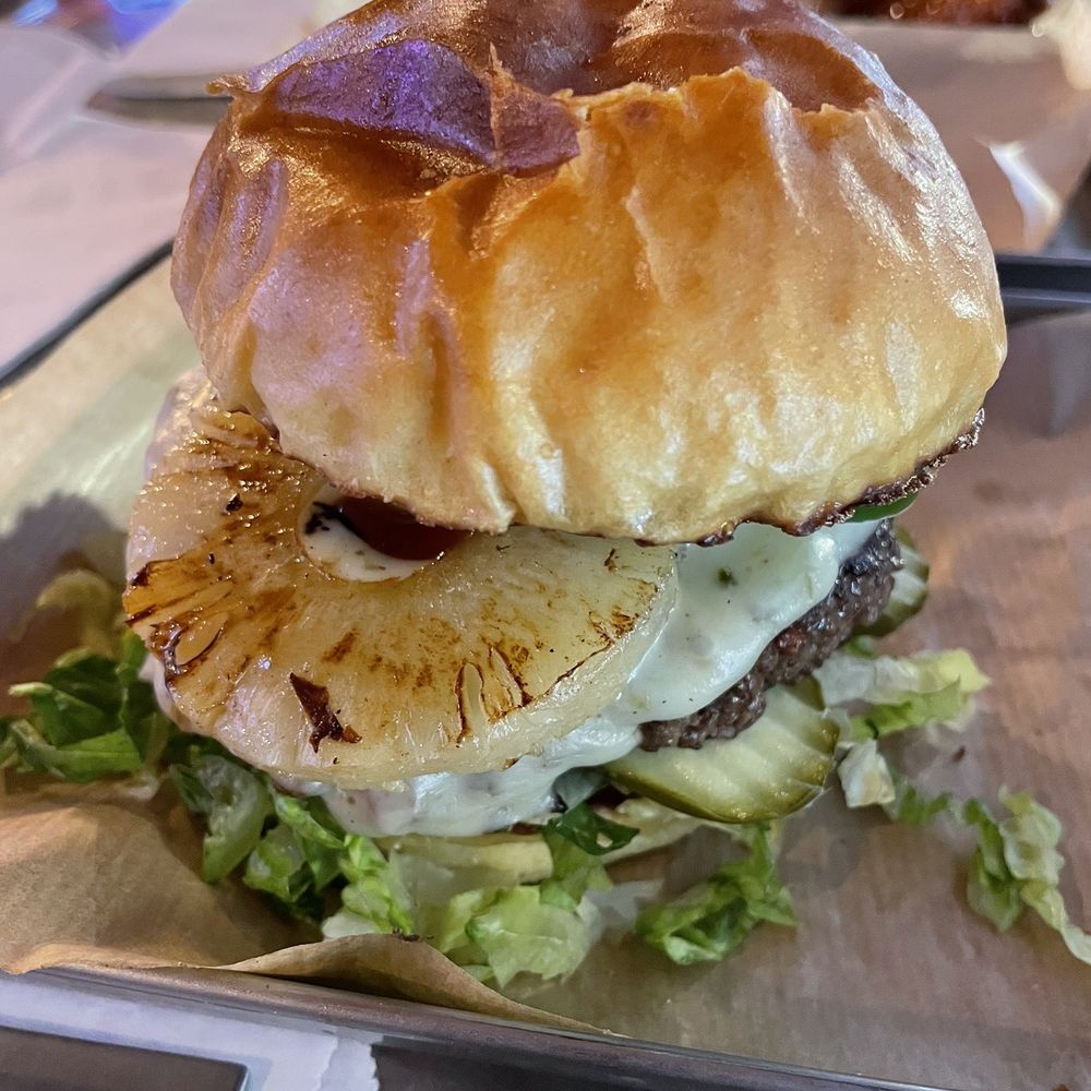 The District Pub & Grill - Jamaican Jerk burger - New American Near Me - Eau Claire, Wisconsin The District Pub & Grill - Jamaican Jerk burger - New American Near Me - Eau Claire, Wisconsin