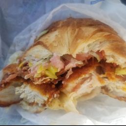 Spicy chicken BLT on a toasted croissant with pepper jack cheese, mayo and banana peppers. Spicy chicken BLT on a toasted croissant with pepper jack cheese, mayo and banana peppers.