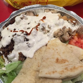 The Halal Guys - Would have way more red sauce, but I'm on the back of a Harley all day tomorrow. - Halal Near Me - Costa Mesa, California The Halal Guys - Would have way more red sauce, but I'm on the back of a Harley all day tomorrow. - Halal Near Me - Costa Mesa, California