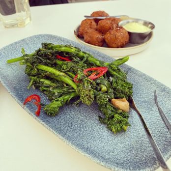 Kost - zucchini fritter, rapini - American Near Me - Toronto, Ontario Kost - zucchini fritter, rapini - American Near Me - Toronto, Ontario
