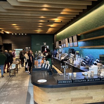 Starbucks - customers in a coffee shop - Coffee & Tea Near Me - New York, New York Starbucks - customers in a coffee shop - Coffee & Tea Near Me - New York, New York
