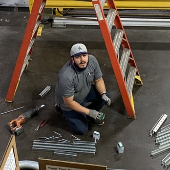 CJ's Electrical Company - Chris Working on Raceway . - Electricians Near Me