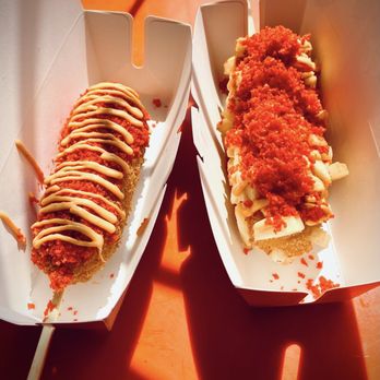 Two Hands Seoul Fresh Corn Dogs - (L) Spicy Dog, (R) Potato Dog - Hot Dogs Near Me - Northridge, California Two Hands Seoul Fresh Corn Dogs - (L) Spicy Dog, (R) Potato Dog - Hot Dogs Near Me - Northridge, California