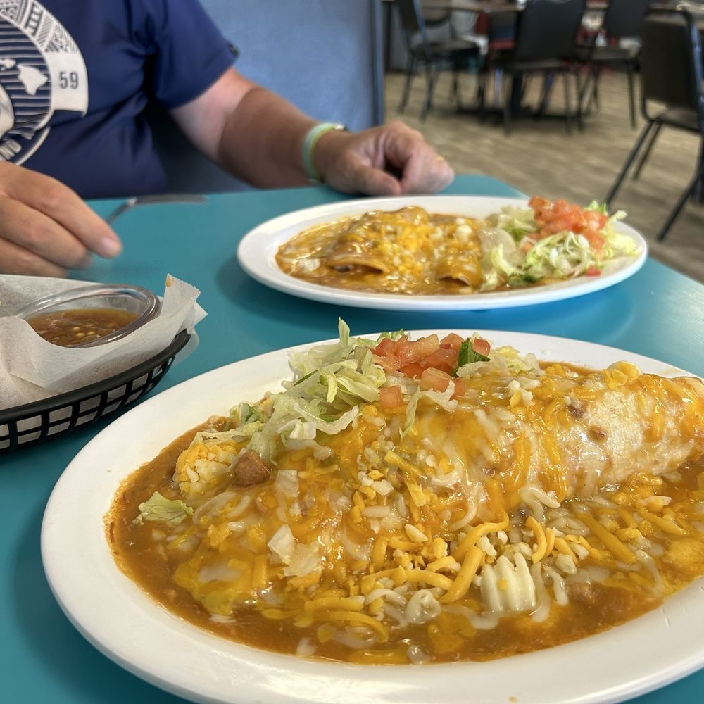 Shredded beef burrito and enchiladas! Definitely a keeper on our restaurant list. Shredded beef burrito and enchiladas! Definitely a keeper on our restaurant list.