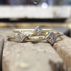 Murduff's Jewelry Store - Hand made princess cut engagement rings. Assorted sizes.
