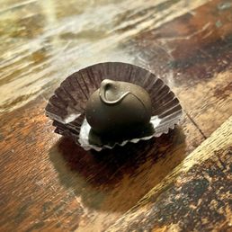Dark Chocolate Truffle. Dark chocolate with a rich chocolate center. Dark Chocolate Truffle. Dark chocolate with a rich chocolate center.