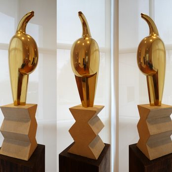 Des Moines Art Center - Constantin Brancusi; Maiastra; 1912-13; polished bronze with stone base - Museums Near Me - Des Moines, Iowa