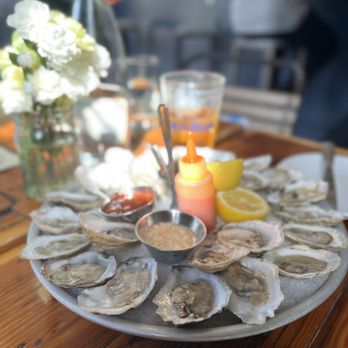 Grey Lady - a plate of oysters on a wooden table - Seafood Near Me - New York, New York Grey Lady - a plate of oysters on a wooden table - Seafood Near Me - New York, New York