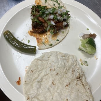 Carnitas Cazo & Pala - a plate of food - Tacos Near Me - Houston, Texas Carnitas Cazo & Pala - a plate of food - Tacos Near Me - Houston, Texas