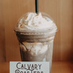 Calvary Roasters - Seasonal Special called "The Milky Way". Cookies and Cream Frappe with Carmel Drizzle and whipped cream (in the cup and on top)