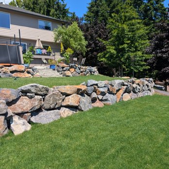 Defeat Contracting - Wall with steps - General Contractors Near Me