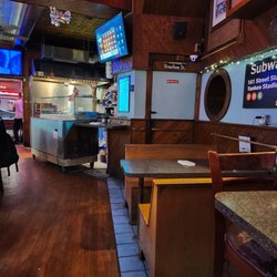 Flat Iron Tavern - Booths, kitchen, pool table in the back