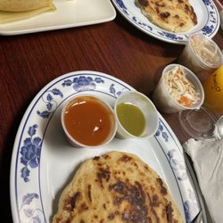 Atitlan - Chicharron pupusa, chicken and cheese pupusa, and tamal de elote