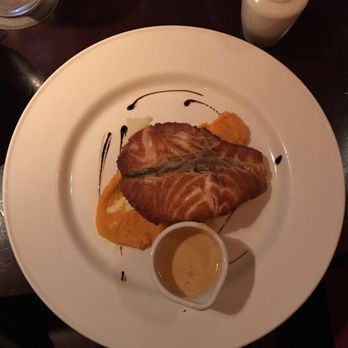The Front Door - Catch of the day: baked salmon atop mash potato and sweet potato, served with creamy dried tomato sauce. - Pubs Near Me - Galway, D