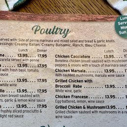 Old menu showing chicken entree prices (with salad included).