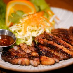 Secrets Of Tiger - Grilled pork.
Thai style charbroiled pork steak.