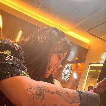 Black Palette Tattoo - Tiare doing the crisp line work - Tattoo Near Me - Honolulu, Hawaii Black Palette Tattoo - Tiare doing the crisp line work - Tattoo Near Me - Honolulu, Hawaii