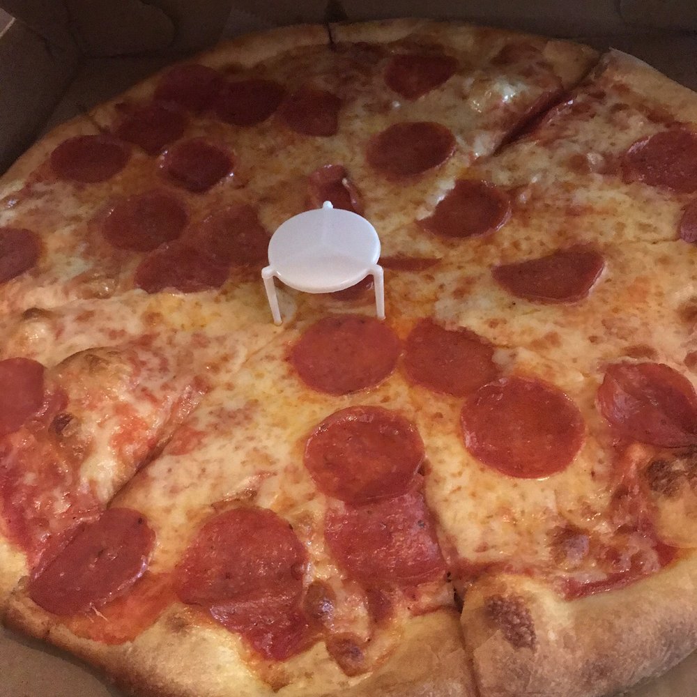 a pepperoni pizza in a box