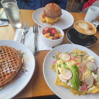 Poached Kitchen - Waffle, egg sandwich, chilaquiles verdes & coffee latte. - Breakfast & Brunch Near Me - Irvine, California Poached Kitchen - Waffle, egg sandwich, chilaquiles verdes & coffee latte. - Breakfast & Brunch Near Me - Irvine, California