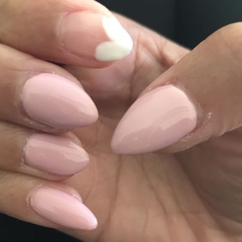 Pink Nails - Cut up cuticles, different lengths and shape on each nail, and a pinky nail leaning wayyyy over on one side. Awful! - Nail Salons Near Me - San Diego, California