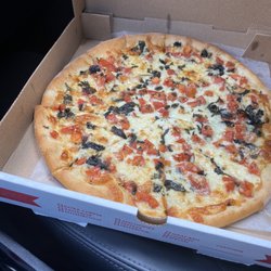 Liliana's Pizza & Grill - White margarita pizza! The tomatoes were cut up and so juicy! Lots of basil and garlic!