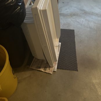 Fast Appliance Repair - Old freezer door reserved for recycling - Appliances & Repair Near Me