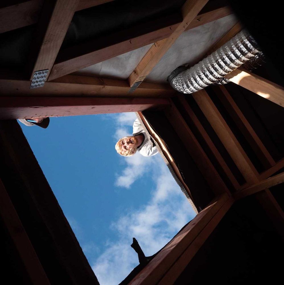 Slide of Liberty City Roofing