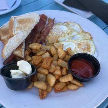 The Rooftop Lounge - 2 egg breakfast with bacon and brioche toast - Lounges Near Me - Laguna Beach, California The Rooftop Lounge - 2 egg breakfast with bacon and brioche toast - Lounges Near Me - Laguna Beach, California