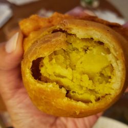 Darbar India Grill & Bar - Interior of vegetable samosa ($5), vegan by default. Bland interior filling.