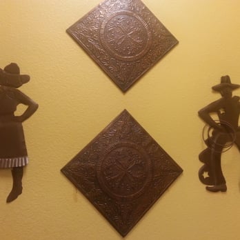 Whataburger - a cowboy and a cowgirl on a wall - Fast Food Near Me - Crockett, Texas Whataburger - a cowboy and a cowgirl on a wall - Fast Food Near Me - Crockett, Texas