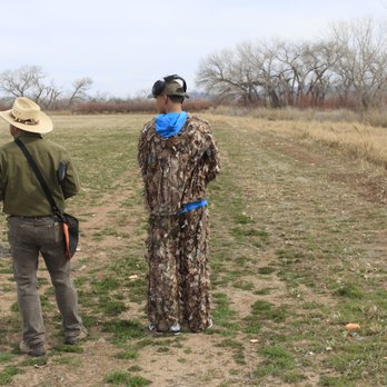 Tinnin Hunt Club - Tinnin Hunt Club.  Ernest G. calling the pointer to work with my son. - Venues & Event Spaces Near Me - Bosque, New Mexico