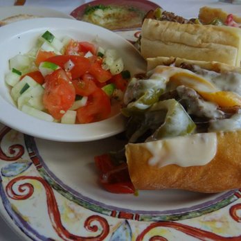 Gianni's Cafe - Italian beef, Italian sausage,cucumber and tomato slices. - Italian Near Me - Kildeer, Illinois Gianni's Cafe - Italian beef, Italian sausage,cucumber and tomato slices. - Italian Near Me - Kildeer, Illinois
