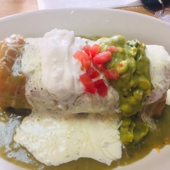 Caminero - Carne Assad chimichanga wet style. Delicious!!! - Mexican Near Me - Peoria, Arizona Caminero - Carne Assad chimichanga wet style. Delicious!!! - Mexican Near Me - Peoria, Arizona