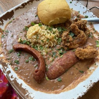 Mambo’s - Red Beans and Rice with Crispy Chicken served with cajun sausage - Cajun/Creole Near Me - New Orleans, Louisiana Mambo’s - Red Beans and Rice with Crispy Chicken served with cajun sausage - Cajun/Creole Near Me - New Orleans, Louisiana