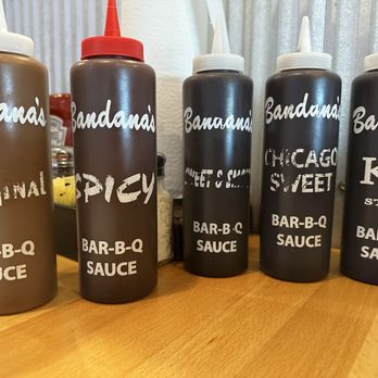 Bandanas Bar-B-Q - Choice of sauces on the table - Barbeque Near Me - Paducah, Kentucky Bandanas Bar-B-Q - Choice of sauces on the table - Barbeque Near Me - Paducah, Kentucky