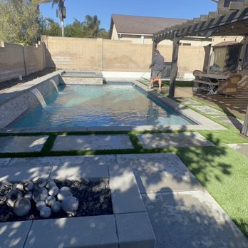 CATAK POOLS - 15x30 pebble sheen pool with 7x7 spa spill-over, 2 sheer decent waterfalls and added fire pit - Pool & Hot Tub Service Near Me - Simi Valley, California CATAK POOLS - 15x30 pebble sheen pool with 7x7 spa spill-over, 2 sheer decent waterfalls and added fire pit - Pool & Hot Tub Service Near Me - Simi Valley, California