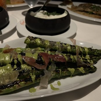 Tango Room - Asparagus, with spinach in the background - Steakhouses Near Me - Dallas, Texas Tango Room - Asparagus, with spinach in the background - Steakhouses Near Me - Dallas, Texas