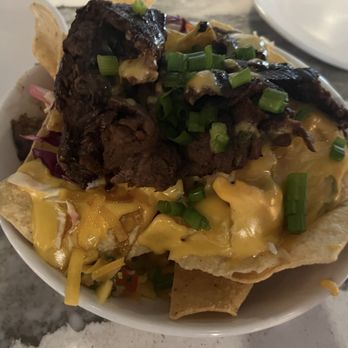 Pines Public House & Eatery - Asian cheese nachos with flank steak - Bars Near Me - Berlin, Maryland Pines Public House & Eatery - Asian cheese nachos with flank steak - Bars Near Me - Berlin, Maryland