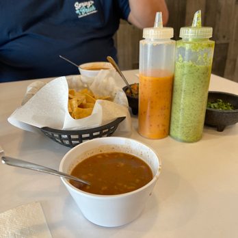 Taqueria 39 - a man sitting at a table with a bowl of soup - Tacos Near Me - Mission, Texas Taqueria 39 - a man sitting at a table with a bowl of soup - Tacos Near Me - Mission, Texas