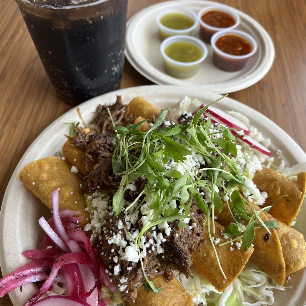 Tito's Taquitos - Potato taquitos covered with shredded beef! Yummy! - Salad Near Me - Portland, Oregon
