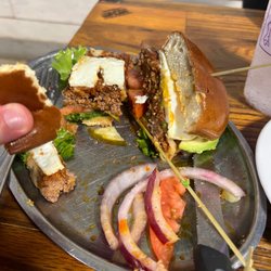 The goat burger has an egg one it!