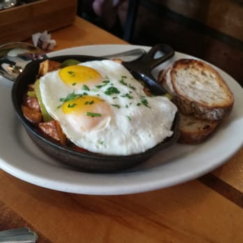 Eats - My brothers breakfast! Eggs ontop of pulled pork, potatoes, bell peppers and some other goodness I can't recall. - American Near Me - San Francisco, California Eats - My brothers breakfast! Eggs ontop of pulled pork, potatoes, bell peppers and some other goodness I can't recall. - American Near Me - San Francisco, California