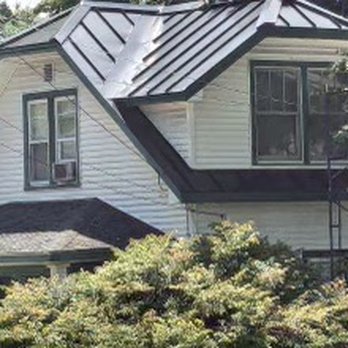 W.E. Brown Roofing - Snap-Loc standing seam metal roofing in black - Roofing Near Me - Keene, New Hampshire