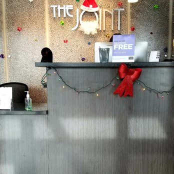 The Joint Tempe Shops - A festive check-in area. - Chiropractors Near Me - Tempe, Arizona