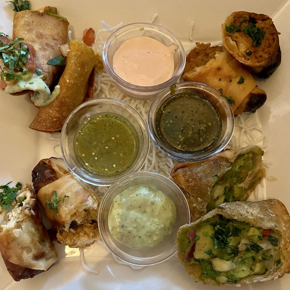 The Cheesecake Factory - Eggroll Sampler - sauces go along perfectly! I like the cheeseburger egg roll! - Desserts Near Me - Westlake, Ohio The Cheesecake Factory - Eggroll Sampler - sauces go along perfectly! I like the cheeseburger egg roll! - Desserts Near Me - Westlake, Ohio
