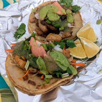 Taqueria Hawaii - Carnitas taco (back) and vegan taco (front). Both really tasty! - Food Trucks Near Me - Mililani, Hawaii Taqueria Hawaii - Carnitas taco (back) and vegan taco (front). Both really tasty! - Food Trucks Near Me - Mililani, Hawaii