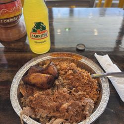 El Caribe Restaurant - Pulled pork, rice and beans, plantains, pineapple soda.