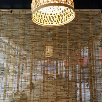 Kyuramen - Flushing - Outdoor seating: Bamboo screens separate each dining booth - Ramen Near Me - Flushing, New York Kyuramen - Flushing - Outdoor seating: Bamboo screens separate each dining booth - Ramen Near Me - Flushing, New York