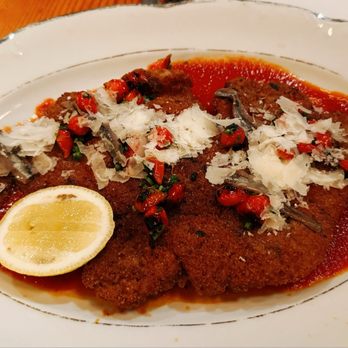 Au Pied de Cochon - Milanese pork chop - Canadian (New) Near Me - Montreal, Quebec